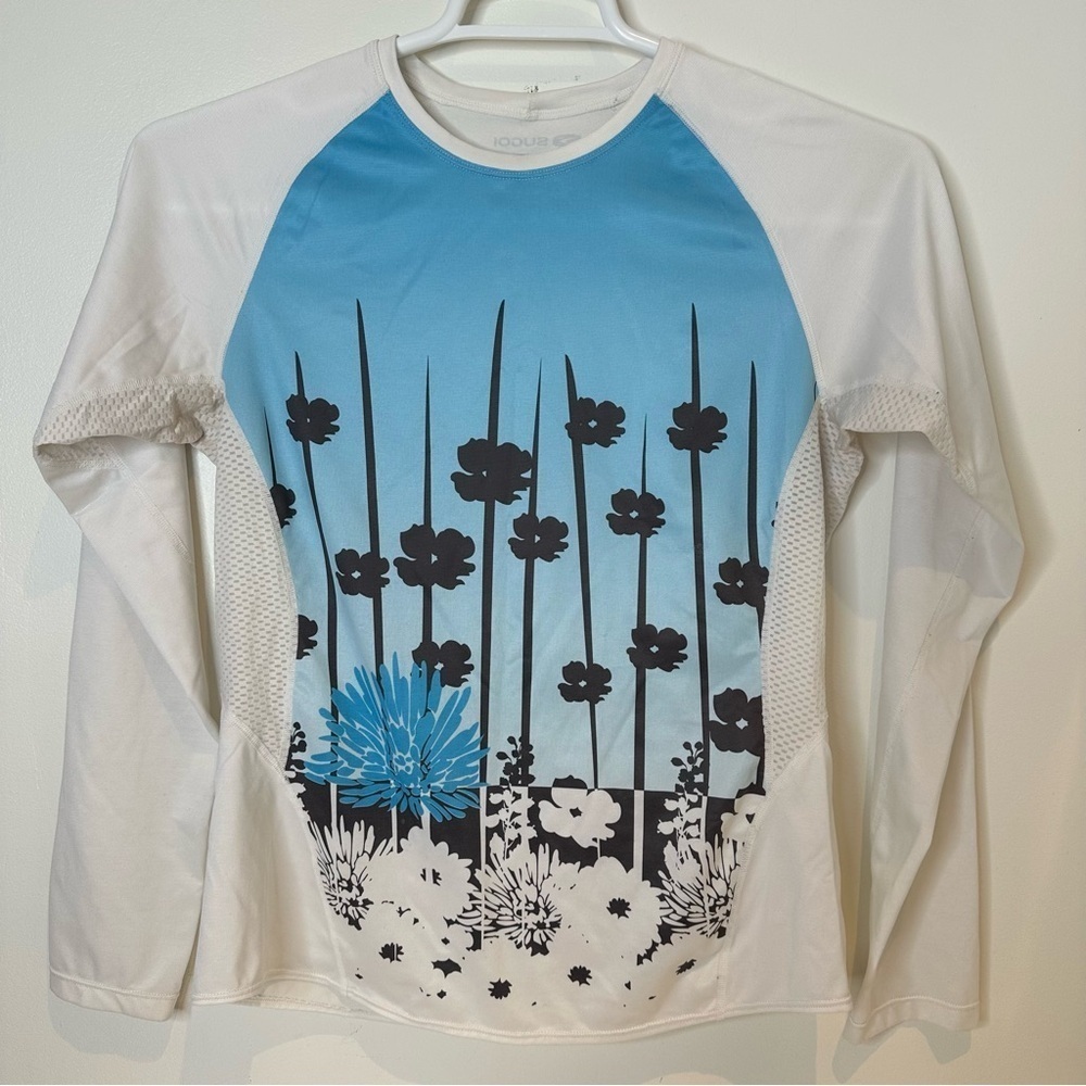 Sugoi women’s athletic floral long sleeve shirt. Size medium
